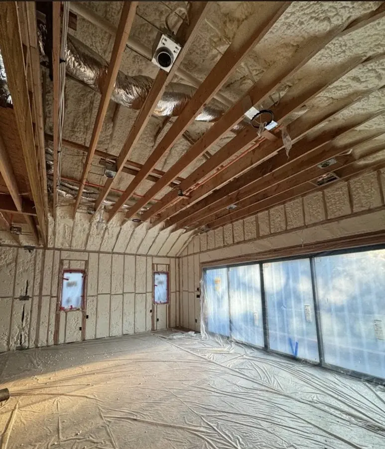 Interior walls and ceiling insulated with spray foam during new construction in Ojus